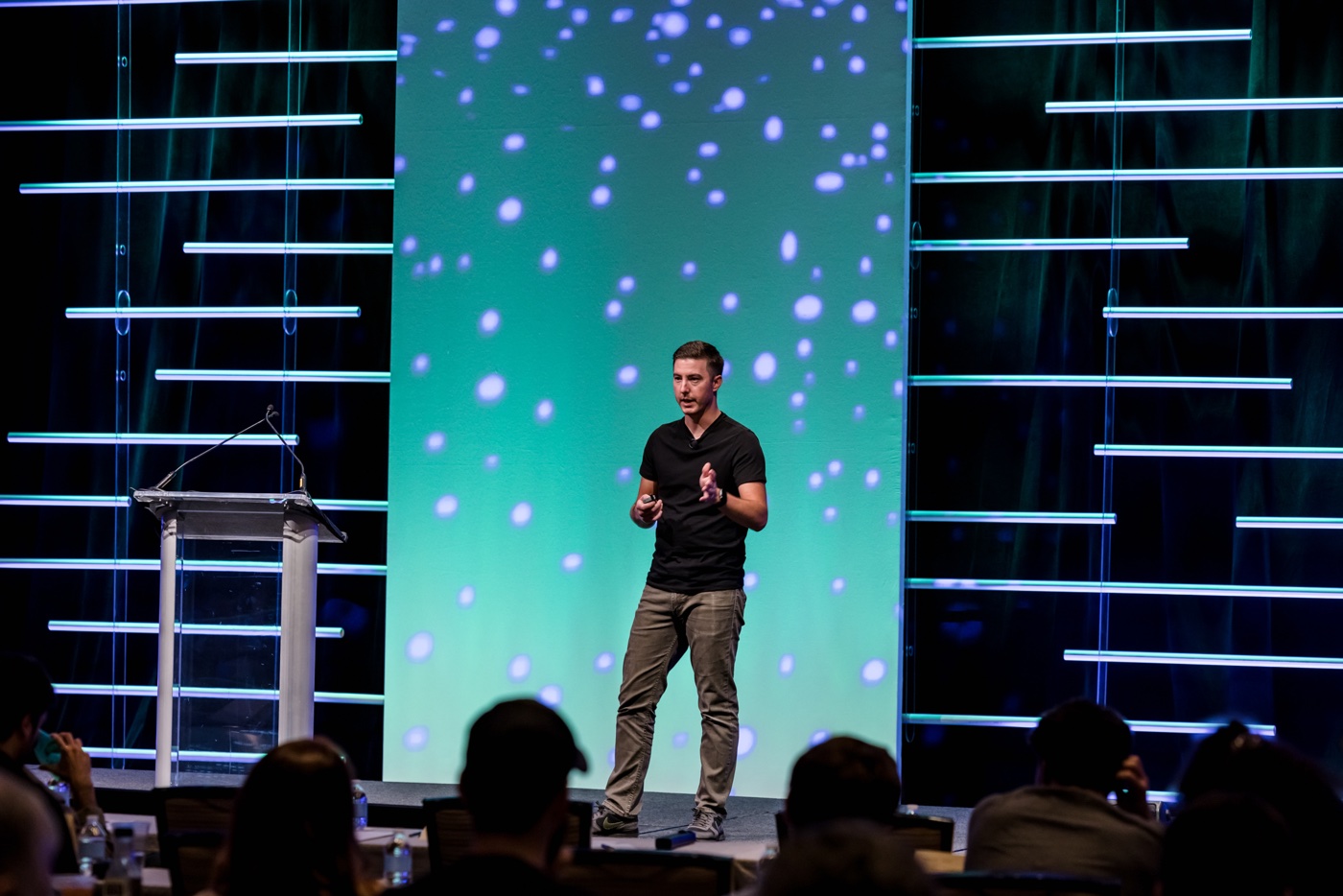 Tom Hegel presenting original threat research on a public conference stage